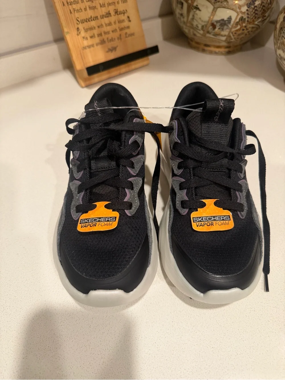 Skechers Kids Black and Orange Vapor Foam Sneakers